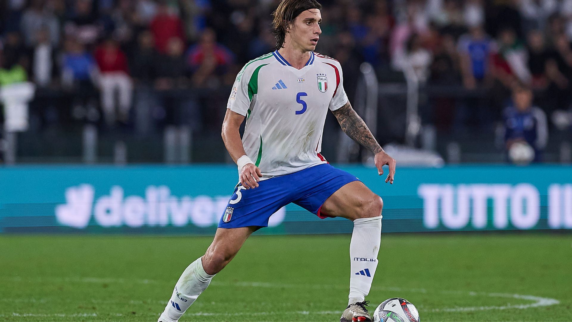 Riccardo Calafiori for Italy.