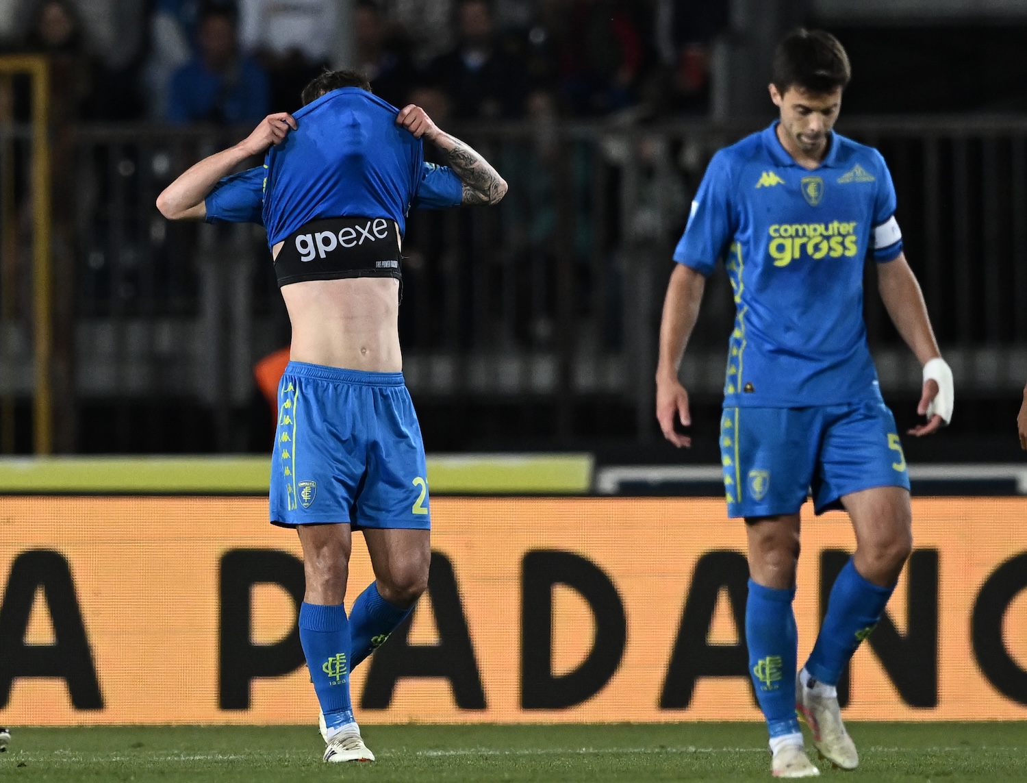 Empoli players react after being relegated from Serie A