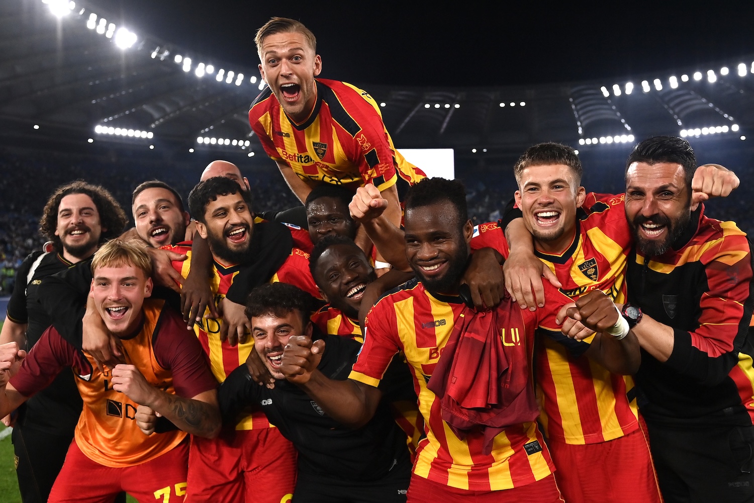 Lecce players celebrate their 1-0 Serie A victory over Lazio